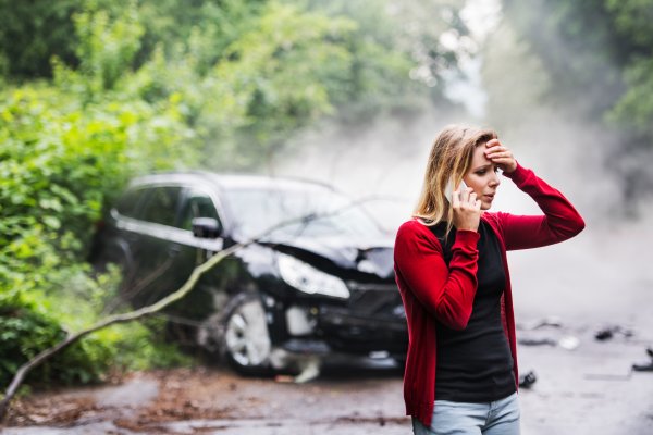 Women on cell phone calling auto warranty